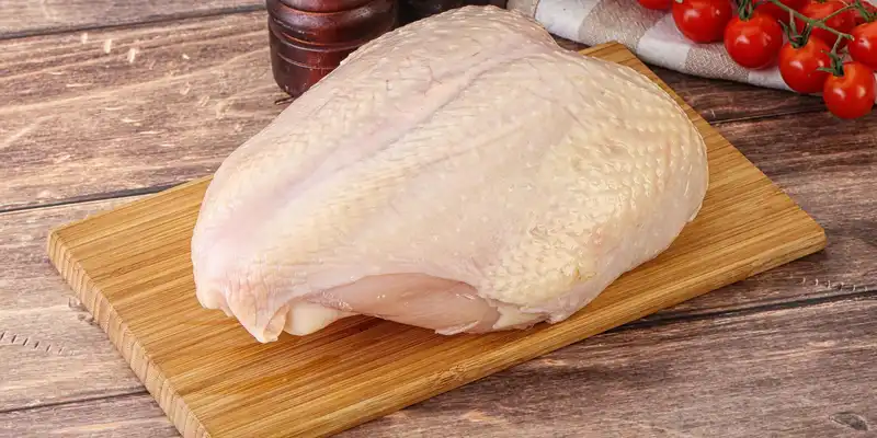 Raw chicken breast (meat and skin)