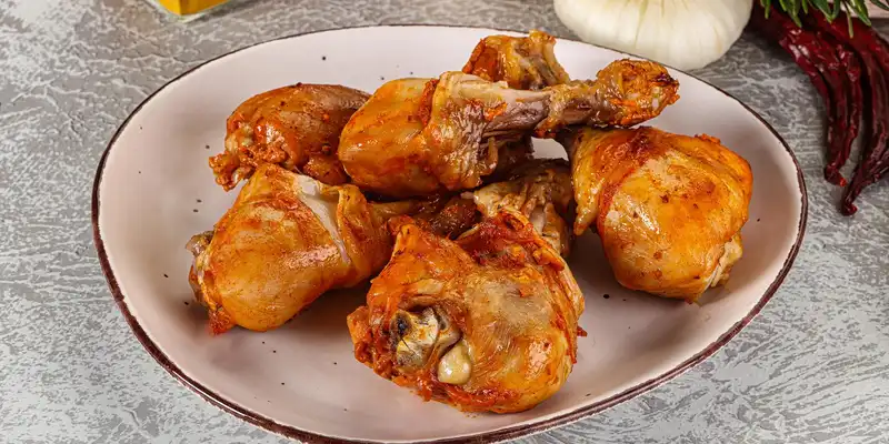 Fried dark meat chicken (meat and skin)