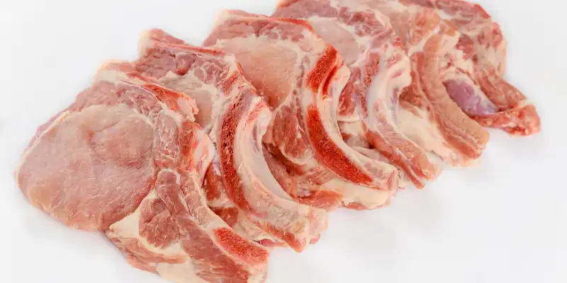 Raw pork center loin (bone in, chops)