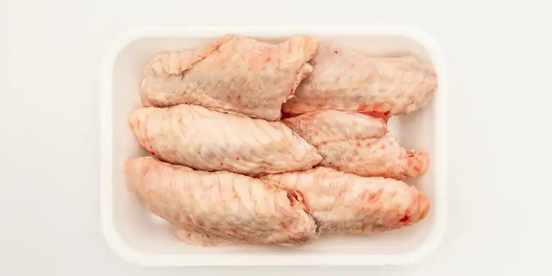 Raw turkey wing (meat and skin)